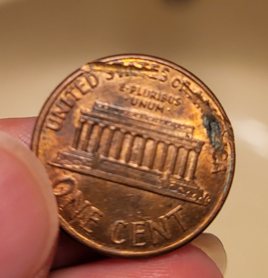 Are-Any-Of-These-Marks-On-My-1989-Penny-Post-Mint-Damage?